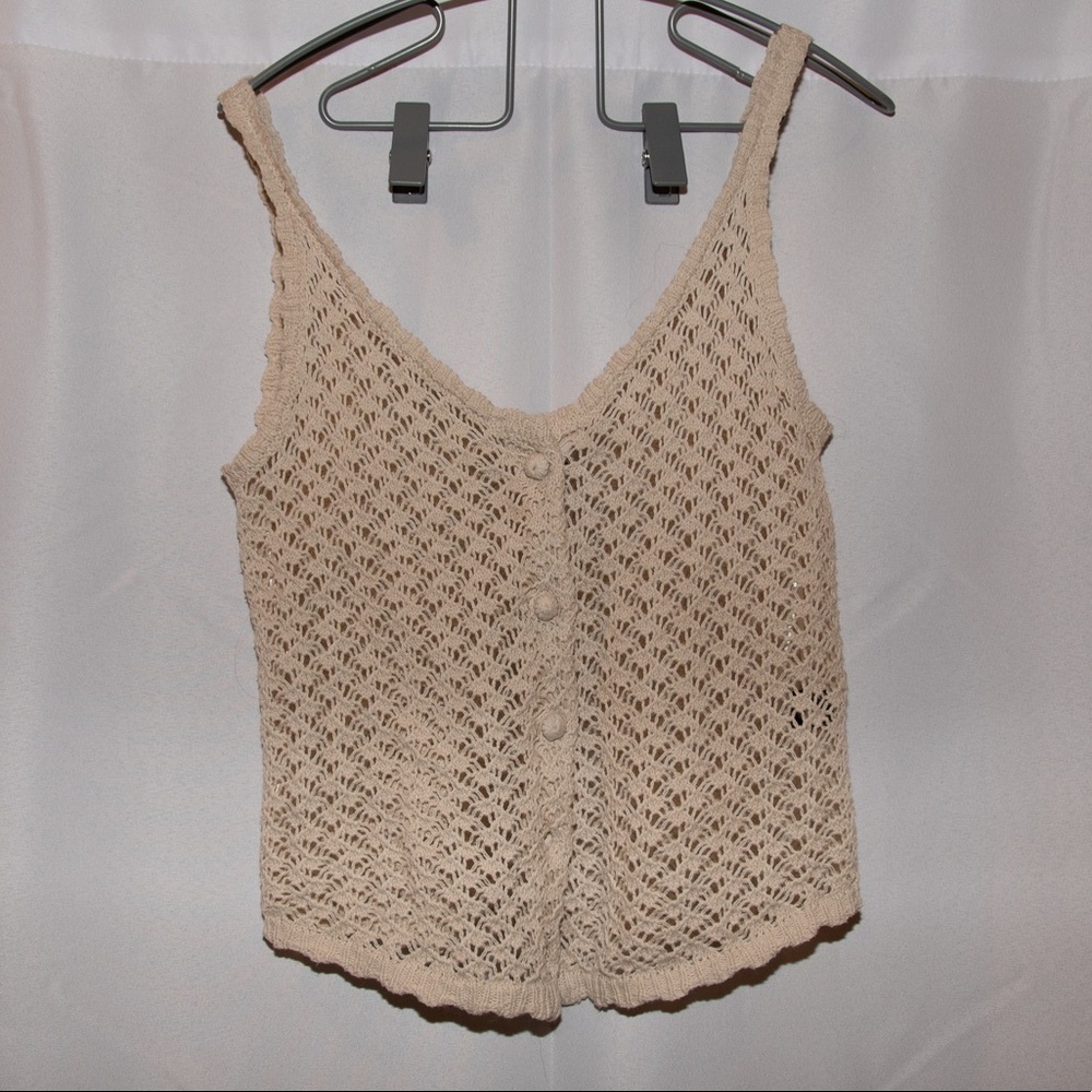 Cream colored knit top